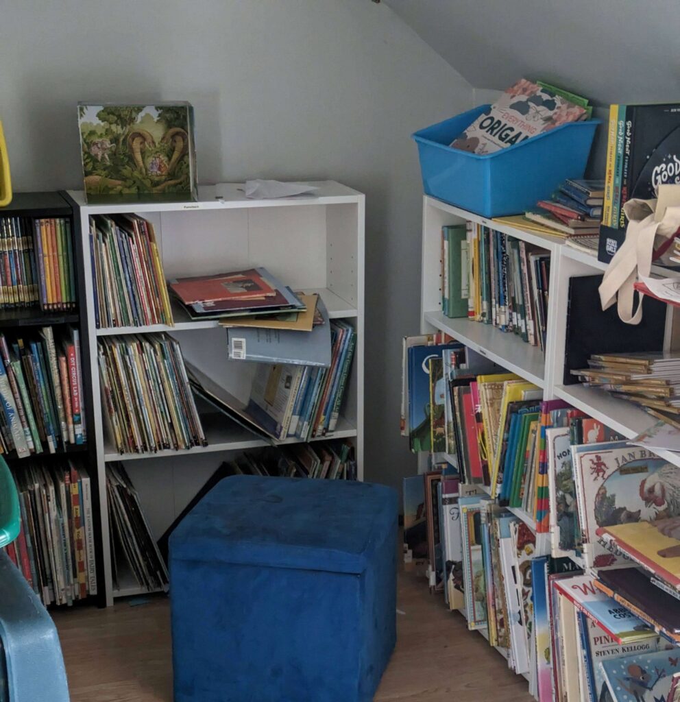 four bookshelves full of picture books and juvenile novels