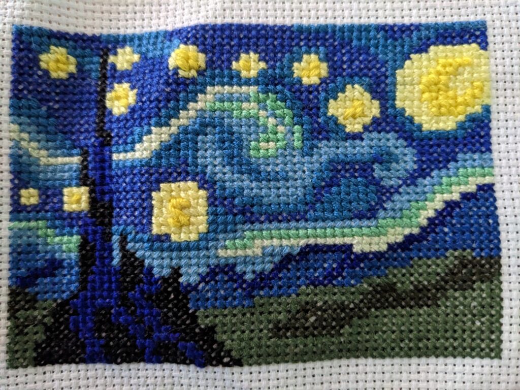 Completed cross stitch of Starry Night