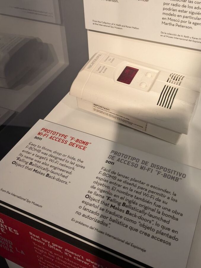 "F-Bomb" Wi-Fi access device, 2011, looks like a square white smoke detector with a small red screen.

Acronym comes from "Falling Ballistically-Launched Object that Makes Backdoors."